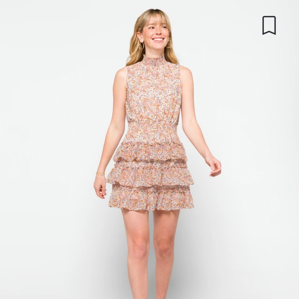 Sleeveless smocked neck ruffle dress